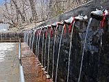 410 Muktinath Chumig Gyatsa 108 Water Spouts Set into the wall at the back of the Central Vishnu Chumig Gyatsa Temple at Muktinath are a set of 108 water spouts carved in the shape of bulls heads.